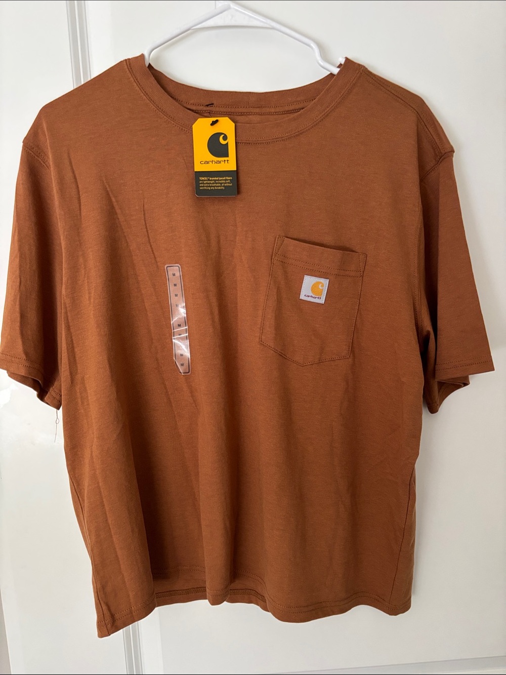 Carhartt women’s Short Sleeve Pocket Tee in Rust Brown